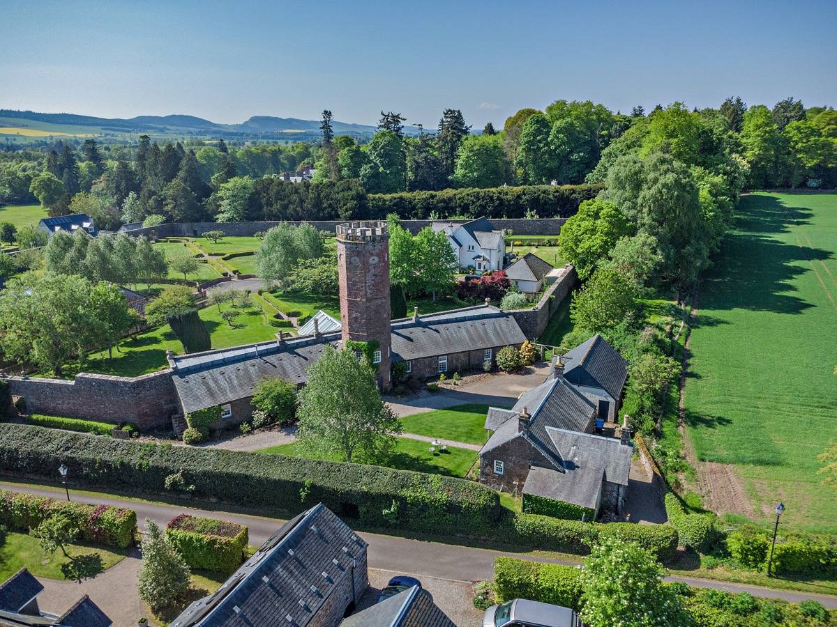 The house and grounds from above, looking south-west across open countryside