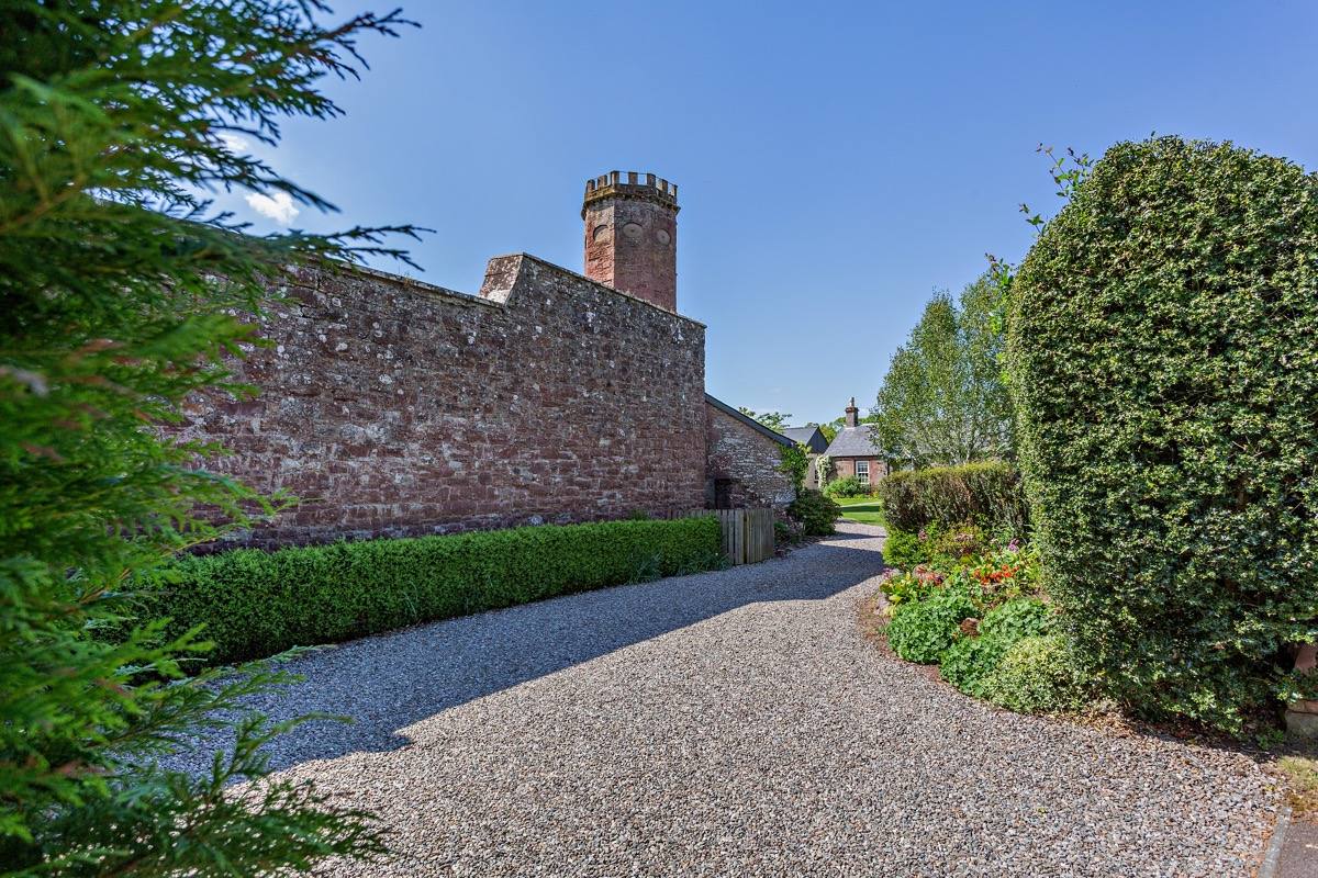 The private driveway approaching the house through Perthshire countryside