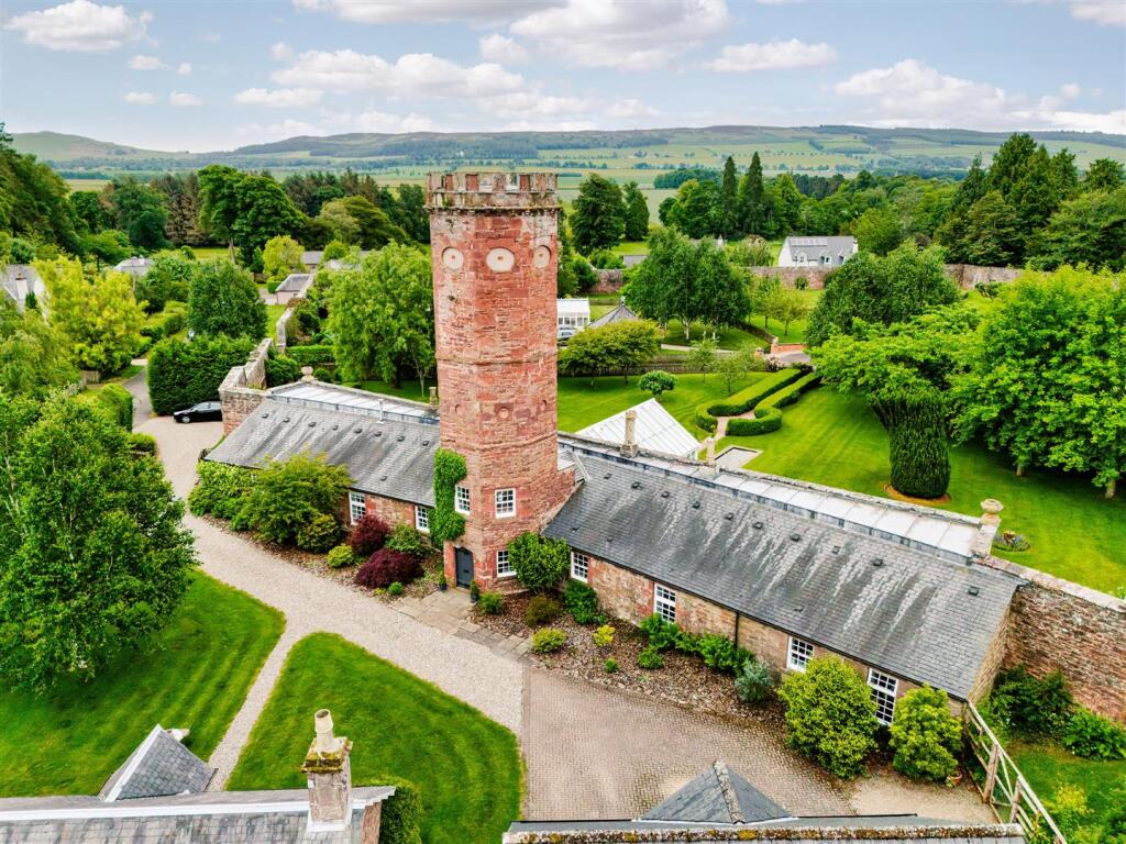 View of the house, tower, and walled garden